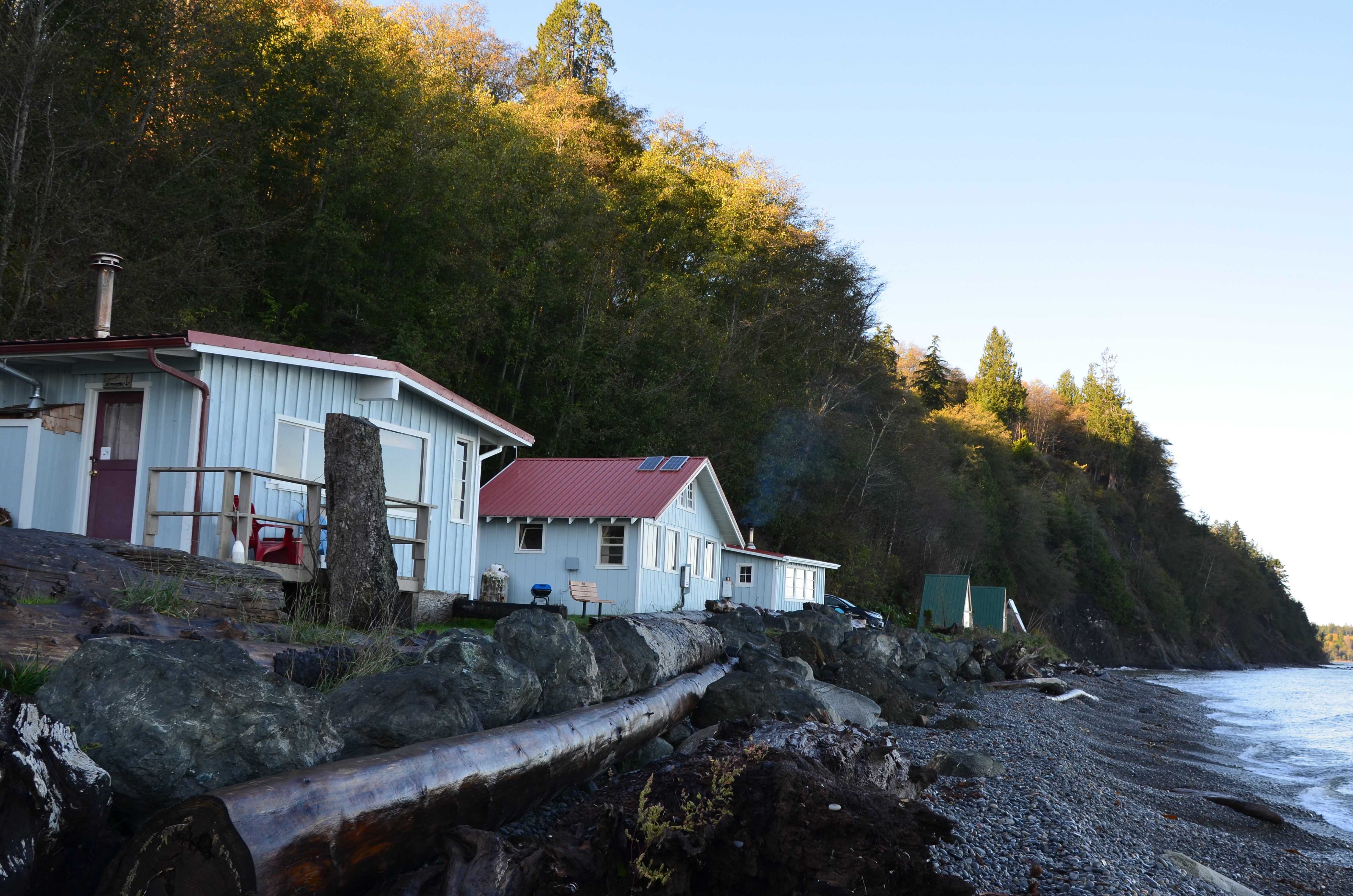 Cabins along the beach at golden hour